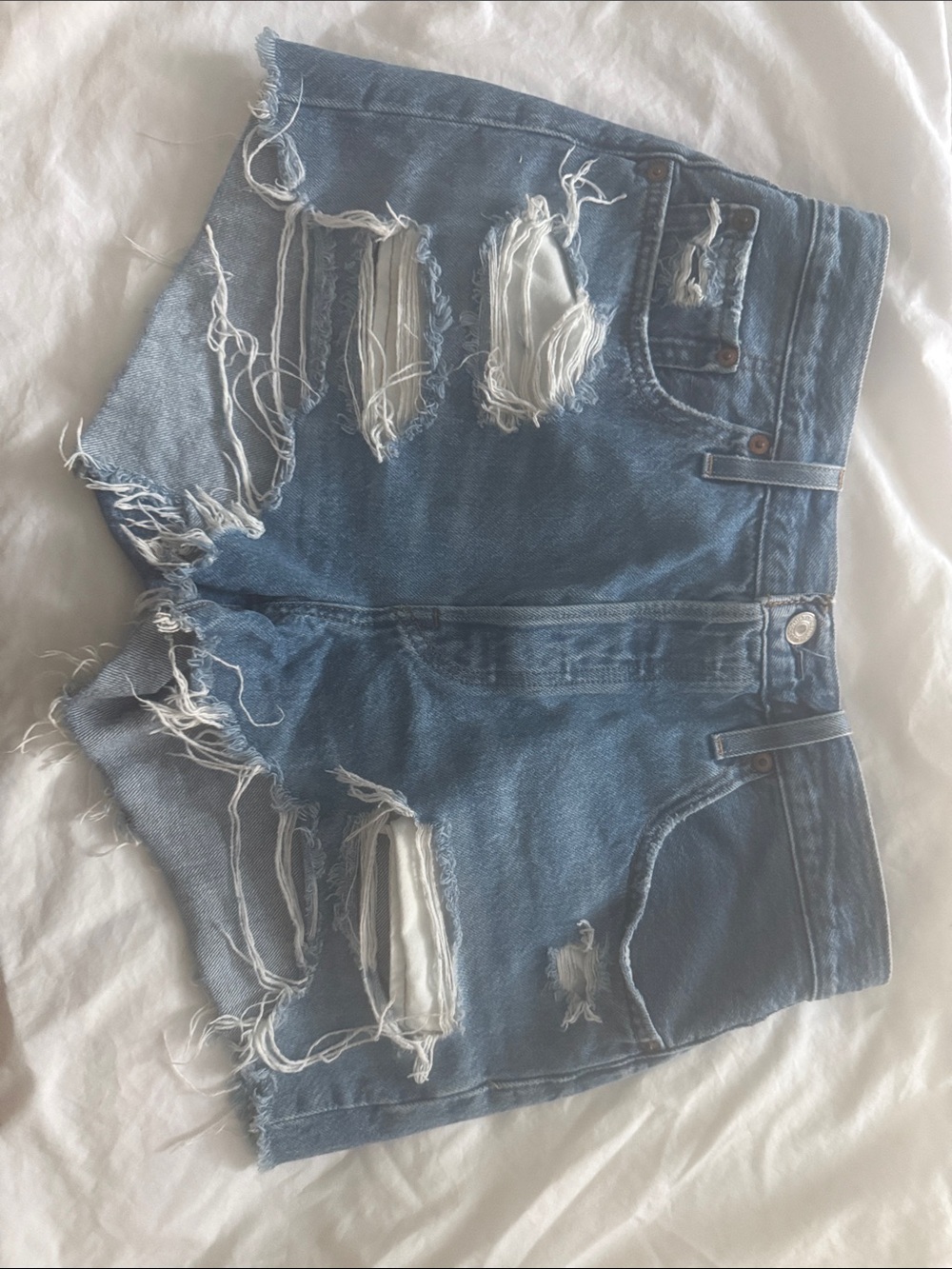 Levi's Distressed Light Blue Denim Cutoff Shorts